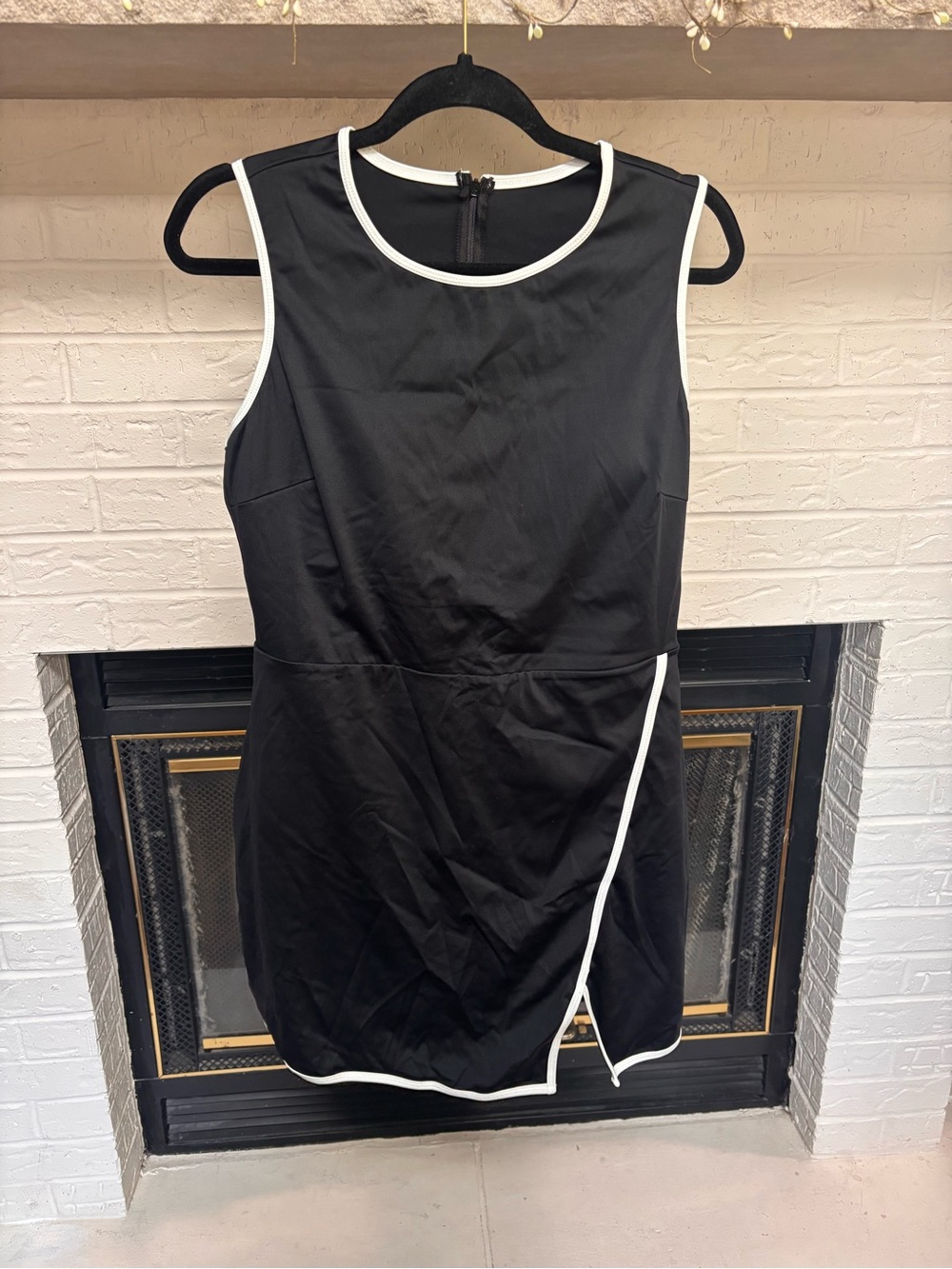 Amazon Black Sleeveless Wrap-Front Romper with White Piping